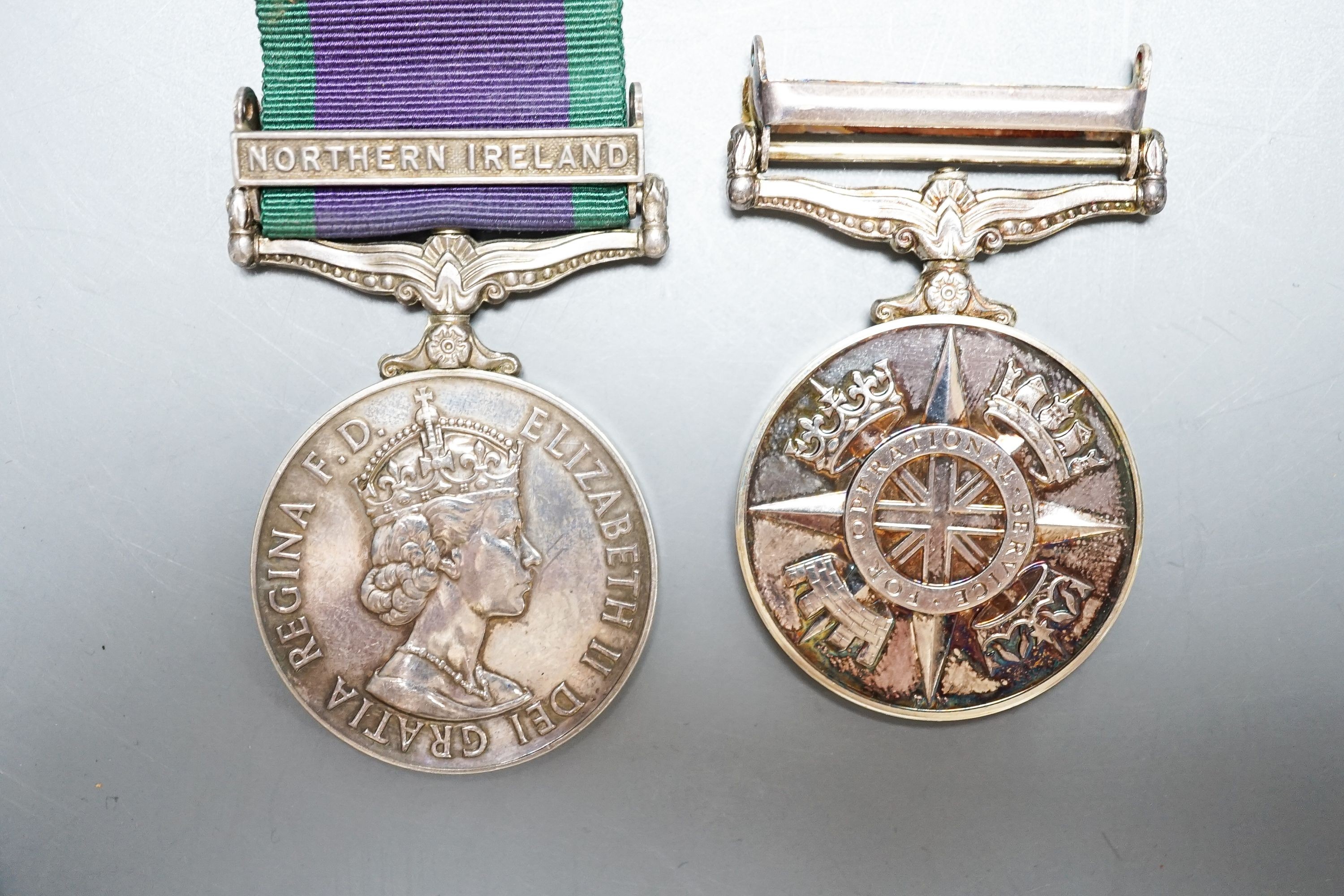 Various QEII medals to include GSM with Northern Ireland clasp to D8008248 SAC R. GILBERT RAF, Afghanistan OSM To 24795570 SGT A. J. PUGSLEY RAMC (R), together with George VI and QEII miniature GSM etc.